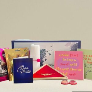 Premium Rakhi Gift Hamper for Brother including Rakhi, chocolates, roli chawal, sweets, greeting cards, and gift box